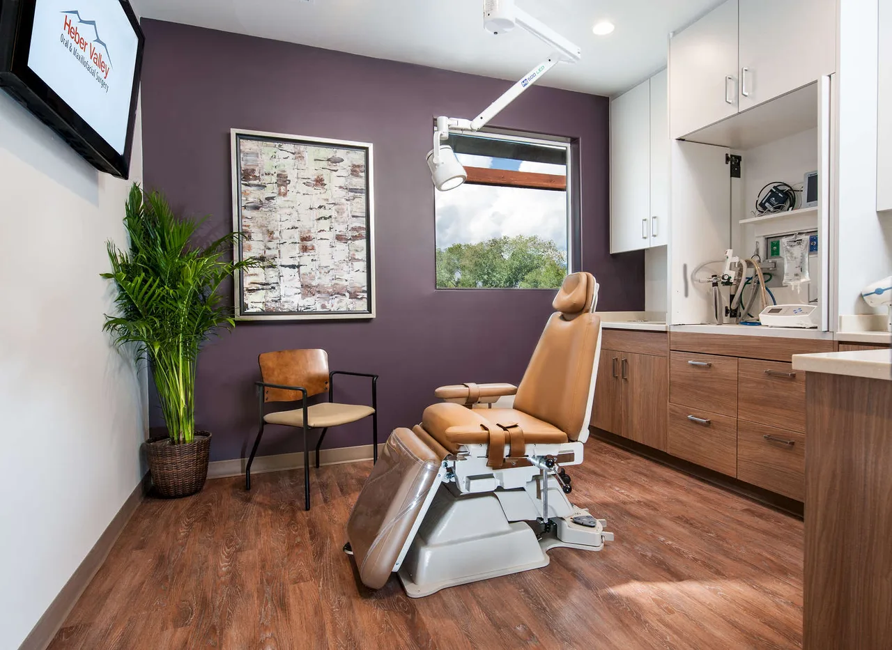 Dental surgery suite with equipment and a treatment chair