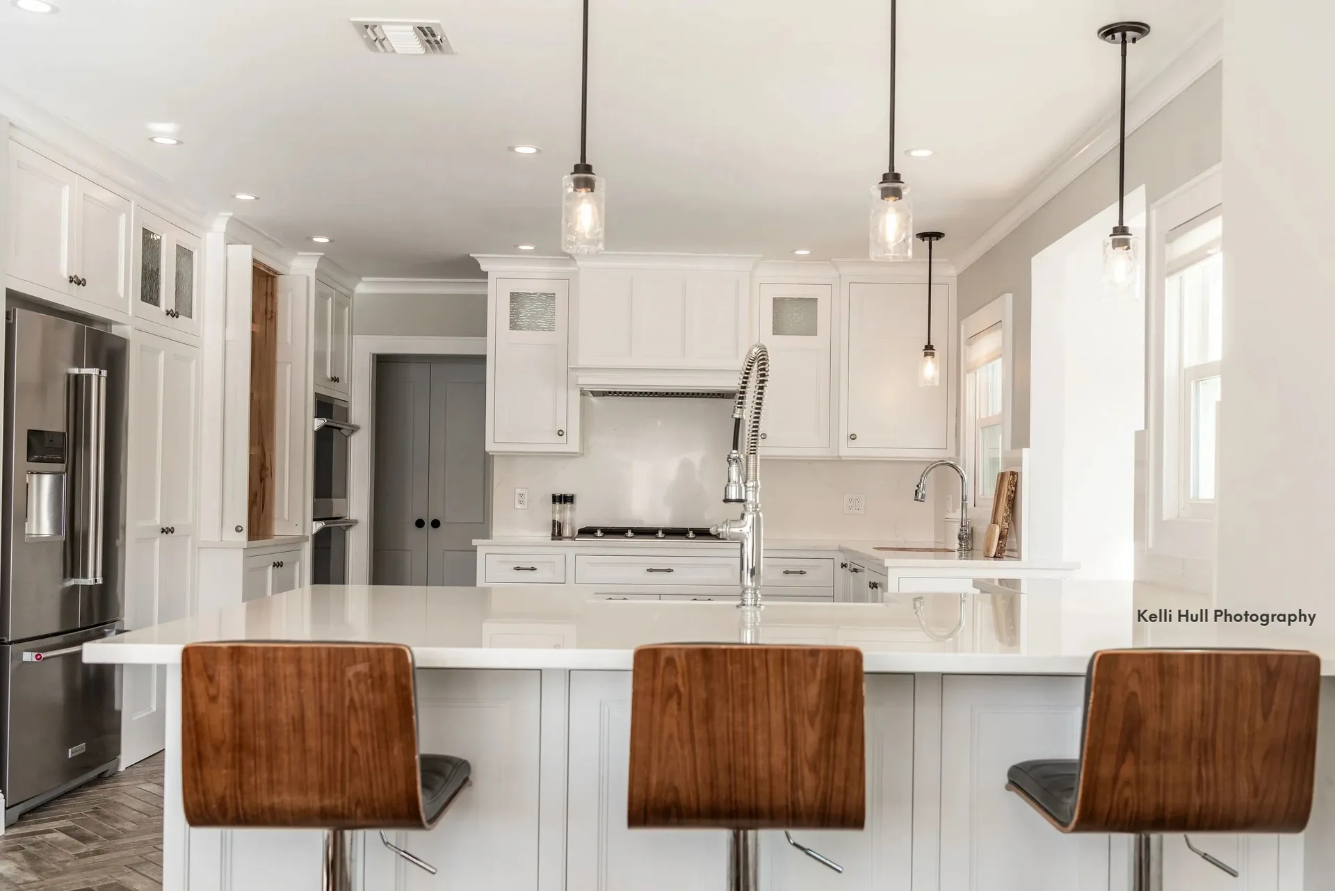 bright white kitchen with walnut stools and pendants, Kitchens & Vanities