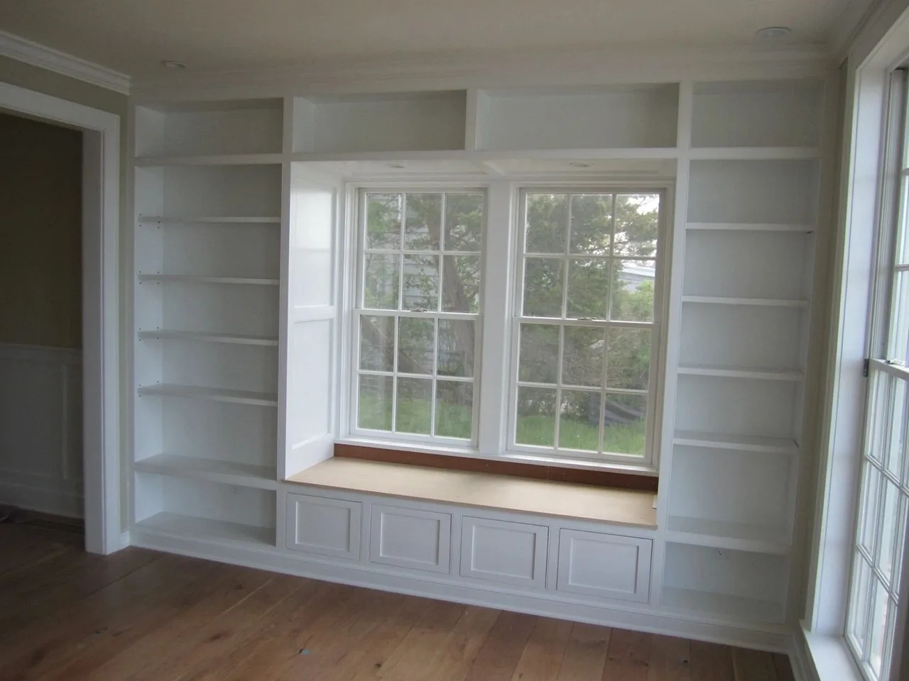 white window-seat built-ins with shelving, Built-Ins & Furniture