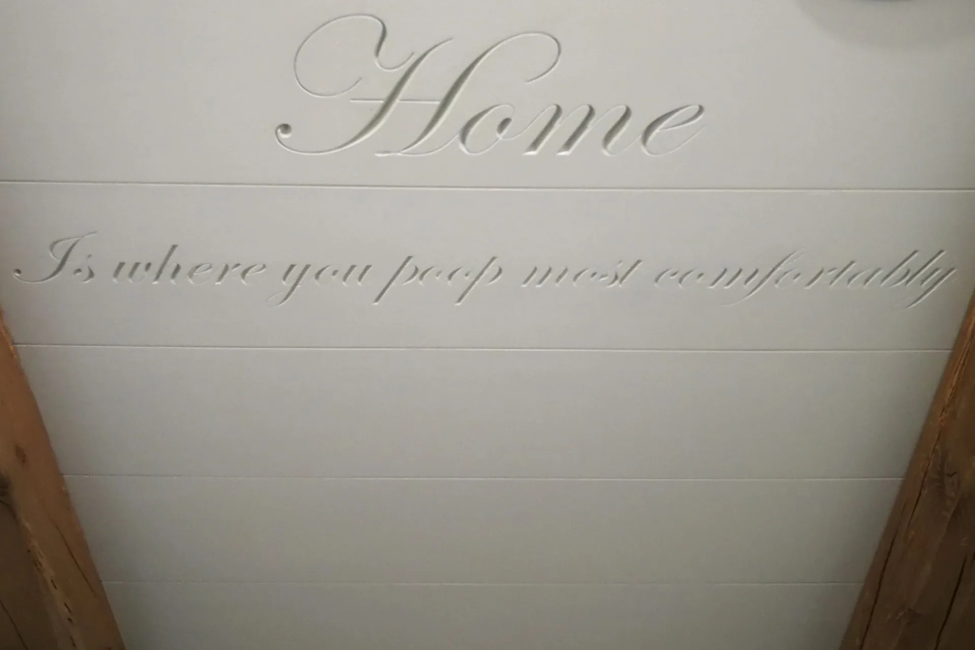 carved script 'Home is where you...' on shiplap, Custom Through Tenon Joinery and Carvings